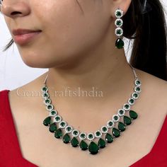 BEAUTIFUL AMERICAN DIAMOND NECKLACE SET *  Main Color : Green * Skin Friendly : This Product does not contain harmful constituents. Anti-allergic safe for Skin. * Quality : Made from Premium Quality Material. This Product assures to remain in its Original Glory even after several usages.     . Actual Images of item are shown above, Please be aware of the actual colors may vary from the color shown on your screen, as monitor    settings may vary from individual to individual. . Welcome to Our Etsy Store! We are genuine seller offering Quality Items at reasonable prices. Every Item is carefully packaged using     the latest Technology to ensure safe shipment for you. We sell Indian Fashion Jewelries . Feedback : We believe in maintaining long term relationship with our each customer. So, You Green Jewel Bridal Necklace For Anniversary, Green Jeweled Bridal Necklace For Anniversary, Anniversary Green Jeweled Bridal Necklace, Hand Set Green Necklace For Anniversary, Green Wedding Necklaces With Sparkling Stones, Green Round Bridal Necklace For Anniversary, Green Bridal Necklace For Anniversary, Green Sterling Silver Bridal Necklace Gift, Green Crystal Necklace For Celebration