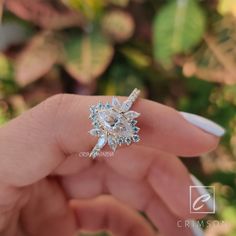 Starburst Ring, 1 Ct Marquise Cut Halo Moissanite Engagement Ring, Cluster Ring, 14K Solid Gold Ring, Lab Art Deco Ring, Celestial Ring ➠ 𝐌𝐨𝐢𝐬𝐬𝐚𝐧𝐢𝐭𝐞 𝐬𝐭𝐨𝐧𝐞 𝐢𝐬 𝐝𝐢𝐚𝐦𝐨𝐧𝐝'𝐬 𝐛𝐞𝐬𝐭 𝐚𝐥𝐭𝐞𝐫𝐧𝐚𝐭𝐢𝐯𝐞. 𝐖𝐞 𝐡𝐢𝐠𝐡𝐥𝐲 𝐫𝐞𝐜𝐨𝐦𝐦𝐞𝐧𝐝 𝐭𝐡𝐢𝐬 𝐨𝐩𝐭𝐢𝐨𝐧. ❆ 𝐂𝐞𝐧𝐭𝐞𝐫 𝐬𝐭𝐨𝐧𝐞 𝐝𝐞𝐭𝐚𝐢𝐥𝐬 💎 ⇢ Shape: Marquise Cut ⇢ Weight: 1 Ct (Approx.) ⇢ Size: 10 x 5 mm ⇢ Cut: Brilliant cut ⇢ Type: Moissanite / Lab diamond (cz) ⇢ Color: Colorless ⇢ Clarity: VS / VVS ⇢ Luste Moissanite Rings With Accent Stones For Proposal, White Moissanite Cluster Ring With Center Stone, White Cluster Ring With Center Stone In Marquise Cut, White Diamond Cluster Ring With Accent Stones, Cluster Moissanite Ring With Center Stone, Wedding Topaz Ring With Moissanite And Accent Stones, White Cluster Ring With Center Stone For Promise, White Marquise Cluster Ring With Center Stone, Moissanite Cluster Ring With Center Stone For Promise