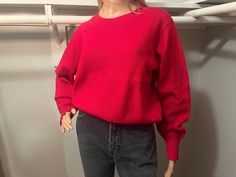 "Warm crewneck pullover for those cool fall and winter days.  Relaxed body and snug in the wrists and waist. A couple of spots on sleeve and waist, with some faint discoloration on the front, however flaws are minimal. Best for XS/S For reference, mannequin measurements are as follows: Height: 69\" (5'9\") Chest: 32\" Waist: 24\" Hip: 34\" All measurements of items listed are approximate, and are taken as accurately as I can to the best of my ability. Please note that with vintage items, there may be signs of wear and small imperfections. When possible, we will show imperfections and the price will reflect these. If you have any questions, or would like to see more pictures, please don't hesitate to reach out." Vintage Solid Sweater For Fall, Vintage Solid Color Sweater For Fall, Vintage Sweater For Fall, Solid Vintage Sweater For Fall, Vintage Long Sleeve Stretch Sweater, Vintage Solid Sweater With Ribbed Cuffs, Vintage Stretch Sweater For Winter, Red Crewneck, Kansas City Mo