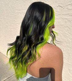 Neon green hair is a vibrant style that can instantly elevate your look. The bright green hue works well with various colors like purple, blonde, and brown. Click the article link for more photos and inspiration like this // Photo Credit: Instagram @the.maverick.studio // #blackandneongreenhair #greenhair #halfblackhalfneongreenhair #neongreenhair #neongreenhaircolor #ombreneongreenhair #shortneongreenhair Brown And Lime Green Hair, Neon Green Peekaboo Hair, Black Hair With Lime Green Highlights, Neon Green Ombre Hair, Neon Green Hair Color, Neon Green Highlights, Neon Green Hair Streaks, Lime Green And Black Hair, Green Halo Hair