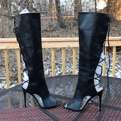 - Designer Via Spiga - Size = Usa 6.5m, Eur 37. Trunk 10 - Msrp =$$522 - Gladiator Back Leather Lace Straps. - Women’s Size Usa 6.5m. Eur 37. - Genuine Black Leather. - Women’s Open Toe Stiletto Heel Boots. - 4.5m Stilettos Heel. - Side Functional Zip. - Height Measured Vertically From Top Tip Of Boots To Bottom Tip Of Stilettos Heel = 46.5cm. - Please Note The Very Superficial Unnoticeable Slight Superficial Scuff On The Heels Gotten During Storage When Other Items Rub Against Them. Reference L Lace-up Party Boots Medium Width, Lace-up Boots With Medium Width For Party, Lace-up Medium Width Boots For Party, Medium Width Lace-up Boots For Party, Medium Width Lace-up Party Boots, Fitted High Heel Boots With Laces, Fitted Open Toe Boots With Wrapped Heel, Fitted Lace-up Boots With Reinforced Heel And Closed Toe, Black Fitted Snip Toe Heels