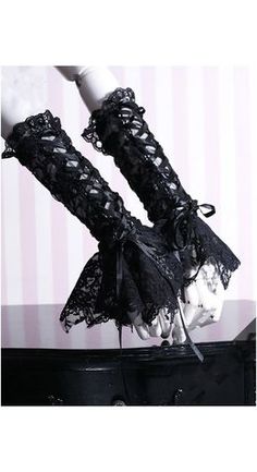 black lace garters are on top of a table