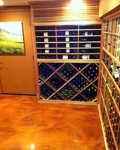 a wine cellar filled with lots of bottles