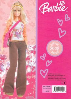 the barbie doll is wearing brown pants and a pink shirt