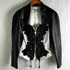 Giovinezza Moda By Rocco D’amelio Vintage Beaded Sequin Leather Jacket Small Good Used Condition No Flaws Found Except The Shoulder Pads Have Been Cut Out As You Can See No Other Flaws Found Very Soft Fine Leather Chest 18” Length 22” Oversized Puff Give This 80s Western Classic A Real Rodeo Queen Look Fitted White Embellished Outerwear, Fitted Black Embellished Leather Jacket, Embellished Fitted Leather Jacket With Long Sleeves, Fitted Embellished Leather Jacket With Long Sleeves, Fitted Long Sleeve Embellished Leather Jacket, Spring Embellished Leather Jacket With Long Sleeves, Elegant Fitted White Leather Jacket, 80s Western, Rodeo Queen