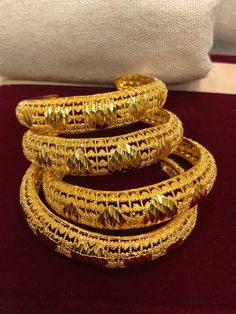 Bangles - Indian Bridal Bangles - handmade Bangles for Women Gold Bangles for Women - Indian Bridal Bangles - Handmade Bracelet These stylish bangles feature a classic bangle design and are available in gold color. Material: High quality 24k gold plated bangles ( Not solid gold) Diameter: 2.36 inches Thick Bangles Wide: 0.53 Can open Lead & Nickel free Tarnish resistant Hypoallergenic Adjustable Hand Set Bracelets For Festivals, Adjustable Hand-set Bracelets For Festivals, Adjustable Round Bangle With Intricate Design, Handmade Bangle Bracelet For Wedding, Handmade Gold Bangle Bracelet, Handmade Gold Bangle Bracelet For Wedding, Handmade Gold Bangle For Wedding, Handmade Gold Bracelets For Wedding, Handmade Round Bangle For Festivals