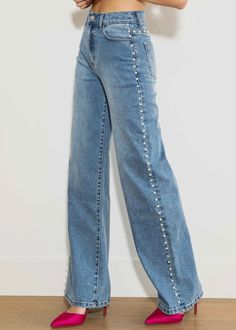 high-rise wide-leg jeans featuring wide pearl stud detail, a 5-Pocket construction and zip-fly closure. Rise: 12", Inseam: 33" Model is 5'7" and wearing a size 3 (wearing heels) these are for my tall girls! runs true to size. Personally, I typically wear a small/ 26 or a 6 in athletic clothing.I wear a size 5 in these jeans! I’m 5.6” and they are perfect with a small heel or a taller heel boot! Fabric: 99% Cotton, 1% Spandex (Some stretch) Pearls are “punched” through! Similar concept to a nut a High Rise Wide Leg Jeans, Studded Jeans, Jean Large, Stylish Jeans, Embellished Jeans, Wide Jeans, Medium Wash Jeans, Tall Girl, Perfect Jeans