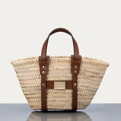 The Ultimate Summer Handbag, This Straw Tote Is Handmade Of 100% Natural Straw And Detailed With Smooth Leather And Polished Hardware For Modern Style. Whether You Carry It By The Double Handles Or Slip It On Onto Your Wrist, This Mini Is The Perfect Companion With Sundresses And Sandals On Holiday. 100% Natural Straw Top Carry Handles Straw/Leather Made In Italy 11”W X 9”H X 5”D 6” Strap Drop 1.4 Lb Summer Handbags, Straw Basket, Straw Tote, Straw Bags, Mini Tote, Denim Bag, Frame Denim, Gold Hardware, Womens Tote Bags