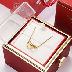 Elevate Your Style with the Unique Twisted Rose Gift Box Custom Engraved Heart Name Necklace Discover a truly one-of-a-kind piece of personalized jewelry that beautifully marries a heart pendant with an enchanting twisted rose gift box. Dive into the intricate details of this exquisite necklace: Pendants and Necklaces: This necklace boasts two meticulously crafted heart pendants fashioned from top-tier stainless steel. Each pendant receives an elegant engraving of your choice, rendered in a graceful font, adding a personalized touch. It dangles gracefully from a coordinating stainless steel chain, harmonizing flawlessly with the pendant's design. Rotating Rose Gift Box: Embrace the allure of the necklace's presentation with a captivating swirling rose gift box. Designed to securely cradle Rosen Box, Eternal Rose, Necklace Gift Box, Rose Gift, Custom Name Necklace, Necklace Box, Silver 925 Necklace, Gifts For Your Girlfriend, Double Heart