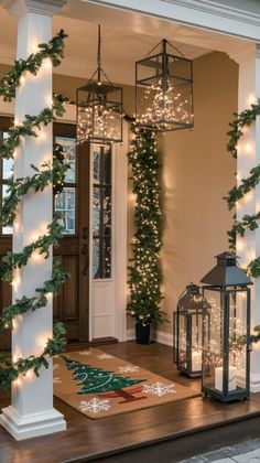 the front door is decorated with christmas lights and garlands