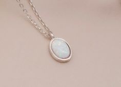 "Handmade Necklace 14k Solid Gold Opal Necklace, Sterling Silver 925 Opal Necklace, Oval Opal Necklace, 14k Gold White Opal Necklace, Gift for Mom, Mom Gift, Mom Gift * Material: High Quality 925 Sterling Silver, 14k Solid Gold * Finished Color: Sterling Silver, yellow and rose gold filled H O W ∙ T O ∙ O R D E R - Select options from the drop-down menu - Add to cart and proceed to checkout GEMSTONE DETAILS Stone: White Opal Size:9x6 mm Shape: Oval *White opal is an excellent grounding stone * I White Gold Oval Cabochon Necklace Gift, Handmade Oval White Gold Necklace, Dainty Oval Hallmarked Necklace, White Oval Link Necklace For Anniversary, White Oval Engraved Necklaces, Gold Opal Necklace, Opal Necklace, Necklace Sterling Silver, White Opal