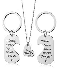 two personalized key chains with the words daddy and daughter engraved on them