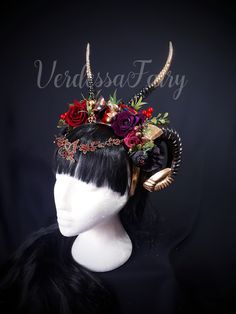 This Fantasy Double Horns Forest Queen headdress is a burgundy, dark purple and gold horned headpiece with berries.  Perfect for a Goddess of Love, Forest Fairy or Woodland Queen theme. This headdress is wonderfully comfortable and surprisingly lightweight for it's size. A very detailed statement piece with lots of little gold sprigs, various coloured berries and lush burgundy, plum purple and black flowers, including velvety roses.  The two sets of horns are hollow and black with gold tips. The Horn Headpiece, Fantasy Headdress, Love Goddess, Dragon Horns, Queens Tiaras, Ram Horns, Winter Bride, Gold Tips, Black Headband