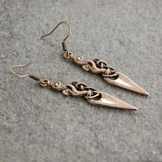 Delicate earrings made in Urnes style The body is made of bronze Earwires are antiallergic Not heavy - 5g is the wage of the pair Total length: 60 mm / 2.4 in Ideal both, as addition to Viking or Slav historical outfit, as well as everyday fashion jewelry ✩ ✩ ✩ ✩ ✩ Visit us on FB @barbariann.jewelry and Instagram @barbariann_jewelry where you can see snapshots from our workshop ✩ ✩ ✩ ✩ ✩