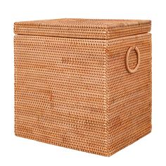 a brown wicker storage box on a white background