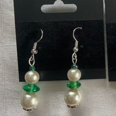 This unique pair of earrings is the perfect gift for any occasion. The vibrant green colors combined with the leaf-shaped bead cap give this pair a nature-y feel that you are sure to love. There is only one in stock, so buy soon! All findings are nickel-free, beads were thrifted, and materials were purchased at respectable stores. Pearl beads are faux. Thank you for shopping with us! If you like what we make, follow us over on Instagram @halcyon_delights Green Beaded Teardrop Jewelry, Green Teardrop Beaded Earrings For Party, Nickel-free Green Earrings For Party, Green Nickel-free Party Earrings, Nickel-free Green Beaded Earrings For Parties, Green Beaded Crystal Earrings, Green Adjustable Jewelry With Matching Earrings, Elegant Green Nickel-free Clip-on Earrings, Green Teardrop Beaded Earrings For Gifts