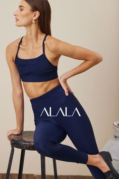 Textured and totally on-trend, shiny ribbed fabric makes this navy strappy sports bra extra special. Looks amazing with the matching tight. Our Alala babes also pair it with jeans or under a blazer for a luxe-leisure look. Blue Cropped Sports Bra For Gym, Blue Cropped Athleisure Sports Bra, Cropped Blue Sports Bra For Workout, Blue Cropped Sports Bra For Workout, Ribbed High Stretch Cropped Activewear, Ribbed Cropped Activewear For Sports, Ribbed Cropped Activewear For Gym, Sporty Ribbed Crop Top For Sports, Sports Ribbed Crop Top