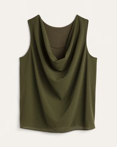 This top combines the comfort of a knit tank with the polished style of a woven blouse. Its sheer woven overlay drapes across the soft and stretchy base, creating a dreamy yet fashion-forward look that works just as well with a blazer as it does on its own. Wear this plus-size cowl-neck blouse underneath a blazer and sleek pants to your next business meeting. East Adeline Hailey Cowl-Neck Blouse | Olive Green | Tops | Materials & Care Instructions: 95% Rayon, 5% Spandex, Hand wash, Made in U Cheap Green Sleeveless Blouse, Cowl Neck Blouse, Plus Size Sewing Patterns, Polished Style, Dressy Skirts, Cowl Neck Tunic, Cowl Neck Top, Business Meeting, Knit Tank