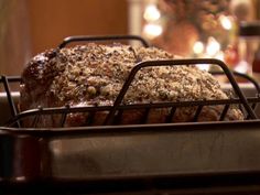 two bundt cakes sitting in a pan on top of a stove