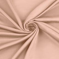 an image of a close up view of the fabric in light pink color, as seen from above