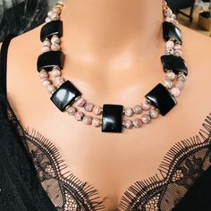 📍 Description :  The handmade necklace has been designed with Rhodochrosite  and black Onyx gemstone.  This necklace  will be an unique gift for Mother's Day, St. Valentine, anniversary , birthday  wife and girlfriend,  💥  The colours of the stones may differ slightly in photo shoots caused by lighting and reflections. ✂ Materials : The natural stones used isare ; Rhodochrosite  and Onyx gemstones   The chain and gold-colored materials used are 14 carat gold plated on brass and do not tarnish. Elegant Rhodonite Jewelry For Gifts, Elegant Rhodonite Jewelry Gift, Elegant Jewelry With Natural Rhodonite Stones, Elegant Rhodonite Jewelry With Natural Stones, St Valentine, Anniversary Necklace, Necklace Mom, Valentine Anniversary, Onyx Gemstone