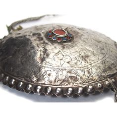 Turkmen Silver Pectoral Adornment Chain Length 24" Plate Diameter 5 1/2" Approx 90% Silver Created sometime early to Mid 20th Century with significant signs of use and wear. Fine Silver Adornments in this style are extremely rare. This would have represented a significant part of a Woman's Dowry Jewelry and has a relation to Fertility and Health. Antique Locket Necklace For Festivals, Antique Locket Jewelry For Festive Occasions, Antique Locket For Festive Occasions, Ornate Heavy Jewelry For Ceremonial Occasions, Heavy Ornate Jewelry For Ceremonial Occasions, Ornate Ceremonial Jewelry, Vintage Jewelry For Rituals And Festivals, Vintage Jewelry For Festivals And Rituals, Traditional Metal Necklace For Ceremonial Use