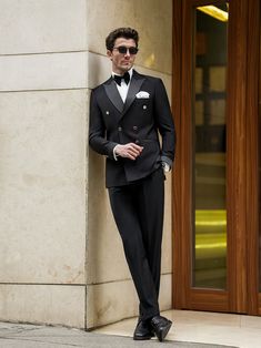 Black Double Breasted Tuxedo 2-Piece Tailored Double-breasted Tuxedo For Formal Events, Tuxedo Style Semi-formal Pantsuit With Double Button Closure, Semi-formal Tuxedo Style Pantsuit With Double Button, Tailored Double-breasted Tuxedo Pantsuit, Tuxedo Style Pantsuit With Suit Collar For Semi-formal, Elegant Tailored Double-breasted Sets, Semi-formal Tuxedo Pantsuit With Notch Lapel, Formal Double Breasted Suit For Workwear With Single Button, Double Breasted Suit With Single Button For Workwear