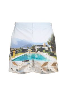 "Find ORLEBAR BROWN Slim Aarons Photographic Bulldog Swim Shorts on Editorialist. Orlebar Brown \"Bulldog\" swim shorts Slim Aarons artwork reworked exclusively in house Adjustable branded nickeleffect side fastener Nickeleffect concealed snap closure Front slash pockets Single back pocket Mid length Polyester Made in Portugal" Fitted Beachwear Shorts For Vacation, Relaxed Fit Shorts For Poolside Vacation, Short Bottoms For Pool Vacation, Vacation Pool Bottoms In Short Style, Vacation Poolside Short Bottoms, Beachwear Shorts For Spring Pool Season, Summer Bottoms For Pool In Short Length, Poolside Beachwear Bottoms In Short Style, Short Summer Bottoms For Pool