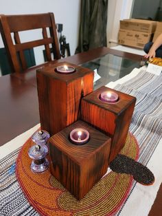 ~HALLOWEEN DECORATION TIME~ This is a 3-piece of Tea Light Candle Holders that are 100% Handmade, that is burned and finished. It is extremely unique and the process highlights the natural beauty of the grain, it's finished with Tung oil for a waterproof finish. The technique they are created with gives them a textured feel and look. When finished with oil it really makes the natural wood color stand out.  We pride ourselves on making high-quality products that will last. These candle holders are something that will look great anywhere in your home and that you will love because they are simple yet unique.  Measurements approx:  Height: 4" ; 6" ; 8" Width: 3 1/2" x 3 1/2" In the Box: 3 Candle Holders (Varies Heights) 3 black tea light candles Shipping Info: All shipping will be via  USPS a Tea Light Candle Holders, Sugi Ban, Craft Wood, Shou Sugi Ban, Single Candle, Light Candles, Tung Oil, Halloween Candles, Woodworking Ideas