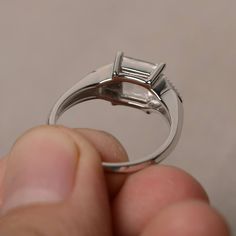 This is a gorgeous handmade creation. Its beauty is its simplicity & Elegance. The 7*7 mm square shape faceted natural white topaz is crafted in solid sterling silver and with rhodium plated. All item is sent in a beautiful gift box If you have any idea of design your ring,pls contact me directly. You can realize more lovely stuff clicking the link https://www.etsy.com/shop/knightjewelry?refshopsection_shophome_leftnav Please leave the correct address and you phone number for delivering succ Ring Princess Cut, Wedding Rings Princess Cut, Princess Cut Rings, Ring Gemstone, Topaz Ring, Beautiful Gift Boxes, Square Shape, White Topaz, Princess Cut