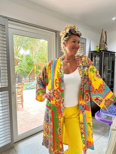 Women's silk kimono robe 👘made by Monelia  with print ala Sicily bright yellow color. Handmade. Universal size. M-XL Silk with viscose 70 silk/30 viscose Viscose lining Silk kimono lined with print ala Sicily  This is a stylish accessory in the japanese style with a touch of Bohemia. I give old pieces new life by using antique materials to create jewelry, bags and clothing. My idea is that you do not have to look for accessories for the image in different places, but can purchase a set of jewel Yellow Long Sleeve Spring Robe, Bohemian Long Kimono With Vibrant Print, Long Bohemian Kimono With Vibrant Print, Yellow Bohemian Kimono With Kimono Sleeves, Long Kimono With Vibrant Print For Festival, Festival Printed Yellow Kimono, Yellow Printed Kimono For Festival, Festival Yellow Printed Kimono, Yellow Wrap Kimono For Spring