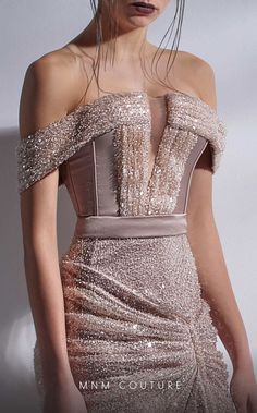 This fitted evening dress is classy and cool. The deep-V corset-style top is complete with boning and a mixed sequin and beaded trim that outlines the off-shoulder straps and the rest of the top. The skirt is the same sparkly sequin beaded fabric, with an off-center slit below the plied hips. Grab this modern glam must-have piece before it's too late. Mnm Couture, Beaded Fabric, Beautiful Long Dresses, Off Shoulder Gown, Corset Style Tops, Pattern Drafting, Beaded Trim, Bustiers, Prom Gown