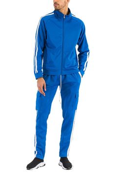 Regular Fit  Full Zip Jacket  Two Stripe Design on Sleeve  Velcro Closure Cargo Pouch  95 Polyester 5 Spandex Athleisure Outdoor Tracksuit With Pockets, Athleisure Tracksuit With Pockets For Outdoor, Stretch Tracksuit With Pockets For Sports, Stretch Sports Tracksuit With Pockets, Fall Sports Tracksuit With Pockets, Fitted Athleisure Tracksuit With Pockets, Sporty Stretch Tracksuit With Pockets, Fitted Sports Track Jacket With Pockets, Fitted Blue Tracksuit With Pockets