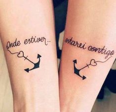 two girls with matching tattoos on their arms, both have words written in cursive writing