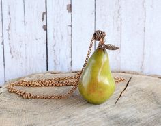 "Chunky long necklace with greenery pear pendant, vegan jewelry, gift for her pear 2\" x 1\" (5x3cm) chain 32\" (80cm) more fruit jewelry https://www.etsy.com/listing/496706714/chunky-charm-pendant-long-boho-necklace?ref=shop_home_active_1 Please, keep the jewellery away from perfume and other alcohol containing fluids because the alcohol damages the Polymer clay. Store the fragile items in separate boxes and treat them with care. Misuse may result in damage. Visit my shop https://www.etsy.com/s Green Pear Shaped Necklace For Gift, Green Pear Shaped Necklace Gift, Green Pear-shaped Necklace For Gift, Handmade Pear-shaped Necklace For Gift, Handmade Pear-shaped Necklace Gift, Pear-shaped Green Jewelry For Gifts, Pear-shaped Green Jewelry Gift, Cherry Necklace, Fruit Necklace