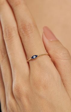 ◾14k Solid Gold Evil Eye Ring For Women, Evil Eye Ring, Charm Dark Blue Eye Ring, Greek Evil Eye Ring, Evil Eye Stackable Ring, Gift for Her Make yourself feel one step ahead with our unique rings that you can buy for yourself or gift to your loved ones. ◾MADE TO ORDER◾ * Raw Material: 100% 14K Solid Gold * Gold Color selection: Yellow Gold, Rose Gold, White Gold * All sizes from 2-11 US * 14k (585) Stamp is available in all our products. * Our products are guaranteed and sent with a certificate. ◾PROCESSING & SHIPMENT◾ Production Process * it is made within 1-3 working days and delivered to the cargo. * All our products are shipped with gold certificate(14k) after quality control. Shipping Process * Cargo is sent by express (1-3). Gold Jewelry Maintenance * You can do it with the help of Blue 14k Gold Ring, Fine Jewelry Rings With Evil Eye For Gifts, Fine Jewelry Evil Eye Ring As Gift, Fine Jewelry Evil Eye Rings For Gifts, Blue Enamel Ring In 14k Gold, Adjustable Blue 14k Gold Rings, Blue Enamel Ring In 14k Gold, Round Shape, Stackable Blue Rings For Gifts, Blue Stackable Open Ring