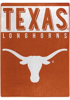 the university of texas longhorns logo on an orange and white blanket is shown