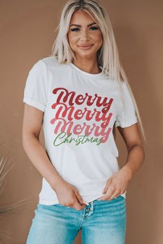 Experience the Christmas spirit with this festive t-shirt. Made with premium fabric, it's lightweight and comfortable with just the right amount of stretch. Available in sizes S-2XL, spread the joy of the season with this Merry Christmas Graphic Tee. Material: 95% POLYESTER + 5% ELASTANE Size Chart (INCH) Sizes Bust Hem_Width Shoulder Sleeve_Length Length Relax Relax Relax Relax Relax S 39.0 41.3 15.7 7.1 25.6 M 40.9 43.3 16.2 7.5 26.4 L 42.9 45.3 16.7 7.9 27.2 XL 46.1 48.4 17.5 8.3 28.0 2XL 49. White Pre-shrunk Christmas Tops, Red Festive T-shirt With Letter Print, Festive White T-shirt With Letter Print, Festive White Crew Neck T-shirt, White Crew Neck T-shirt For Festive Occasions, White Festive Holiday T-shirt, Holiday White Pre-shrunk T-shirt, White Christmas Festive T-shirt, White Christmas Text Print Tops