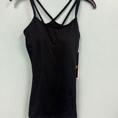 <<> Head Teammate Bra Tank In Black Size Xs 92% Polyester 8% Spandex Machine Wash Made In China Black Tops With Built-in Bra For Training, Black Tank Top With Built-in Bra For Workout, Black Workout Tank Top With Built-in Bra, Black Seamless Tank Top For Athleisure, Black Tops With Medium Support In Elastane, Black Elastane Tops With Medium Support, Black Seamless Tank Top For Training, Seamless Black Training Tank Top, Fitted Black Yoga Top