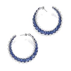 Pair of 18 Karat White Gold, Sapphire and Diamond Earrings. The hoop-style earrings set with 46 oval-shaped sapphires weighing 42.06 carats, framed by round diamonds weighing 7.50 carats Blue Jewellery, Diamond Jewelry Earrings, Dangle Earrings Wedding, White Gold Sapphire, Color Stones, Loop Earrings, Jewelry Images