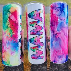 three different colored cans with the word wanna on them