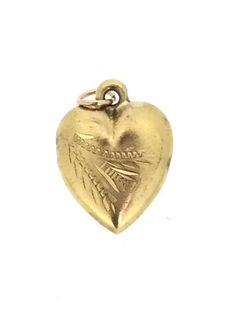 Romantic rolled Gold puffy heart pendant engraved patterns in very good condition measuring 2.2cm x 1.5cm All pieces are unique I aim to provide you with a 5 star service and customer satisfaction is my priority. All my items are vintage and pre owned so at times they will have signs of age but I try my very best to describe them with accuracy. Your purchase will be carefully packed to protect it. If you wish it wrapped as a gift for someone then do let me know please. Vintage Etched Heart Pendant Jewelry, Victorian Engraved Heart Jewelry, Antique Etched Heart Jewelry, Antique Etched Heart-shaped Jewelry, Engraved Antique Gold Heart Pendant Jewelry, Antique Heart-shaped Engraved Jewelry, Gold Heart-shaped Engraved Charms, Gold Engraved Heart Charms, Vintage Engraved Pendant Charms