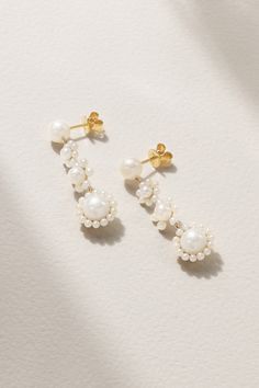 Unlike real flowers, the beauty of Sophie Bille Brahe's blossom-inspired jewelry will live forever. Made from 14-karat recycled gold, these 'Fleur Jeanne' earrings are strung with clustered arrangements of freshwater pearls that sway with every move you make. Wedding Flower Earrings In 14k Yellow Gold, Hallmarked Yellow Gold Elegant Cluster Earrings, Elegant Yellow Gold Cluster Earrings For Anniversary, Elegant 14k Gold Flower Earrings For Formal Occasions, Elegant Round Cluster Earrings In 14k Gold, Elegant Yellow Gold Cluster Dangle Earrings, Elegant Yellow Gold Dangle Cluster Earrings, Elegant 14k Gold Flower Earrings For Anniversary, Timeless Yellow Gold Earrings For Wedding