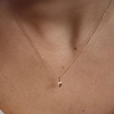 "For someone to be described as having a \"heart of gold\", it suggests they are kind, generous, and honorable. With its removable heart-shaped pendant, literally made from 14 karat 585 solid gold, our adjustable Compassion Necklace encourages you to channel your own kind nature. Purchase the pendant and chain necklace together as a set, or the pendant on its own, to wear with another chain of your choosing. 💝 Ready for gifting: Beautifully packed in a jewellery gift box Details:  ✨ Material: 14k gold (58.3% of gold purity) ✨ Length: 41,0 cm (16.14 inches) + 3,5 cm (1.37 inches) ✨ Pendant size: 10.67 * 5.80 mm (0.42 * 0.22 inches) ✨ You can purchase a chain with pendant or pendant only - it's absolutely up to you. ➕ If you are unsure of the length you need, or you would like to wear this Real Gold Chains, Necklace Extender, Handmade Fine Jewelry, Gold Heart Necklace, Gold Jewellery Design, Gold Heart, Heart Pendant Necklace, Gold Earrings Studs, Huggies Earrings