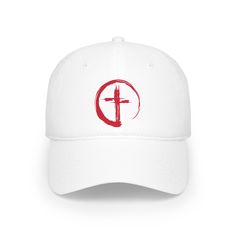 a white baseball cap with the cross on it