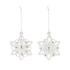 pair of snowflake earrings on white background