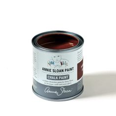 an open can of chalk paint on a white background