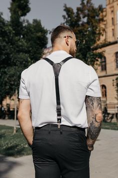 Suspenders are a stylish and unusual alternative to a traditional belt. They are made of durable and high-quality genuine leather, which will make your look more presentable. Leather suspenders will become a highlight of your wardrobe. It will make you stand out from the crowd and help you create a gallant look. Genuine leather suspenders are an ideal accessory for business meetings, various events and celebrations. You can wear them to your own wedding or the wedding of your friends. This is a Black Leather Suspenders, Traditional Belt, Leather Suspenders, Hipster Style, Groomsmen Gift, Hipster Fashion, Business Meeting, Look Plus, Groomsman Gifts