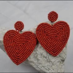 Beaded Heart Earrings. Color Red. Made By The Pretty Jewellery. Made In The Usa. Heart Beaded Earrings For Gift, Heart Shaped Beaded Earrings For Party, Heart-shaped Beaded Earrings For Gift, Valentine's Day Beaded Dangle Heart Earrings, Gift Heart Beaded Earrings, Valentine's Day Heart Dangle Earrings With Beads, Heart Beads Earrings For Valentine's Day, Red Heart Beads Dangle Earrings, Bohemian Heart Beads Earrings For Valentine's Day