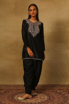 Black straight kurta with embroidery on the yoke using thread work, dabka, bullion and coins. Paired with a pleated pant. - Aza Fashions Black Sets With Floral Embroidery And Traditional Drape, Black Silk Sets With Chikankari Embroidery, Black Silk Sets With Intricate Embroidery, Traditional Embroidered Workwear Sets, Black Embroidered Workwear Sets, Traditional Black Workwear Sets, Traditional Black Sets For Workwear, Black Kurta, Pleated Pant